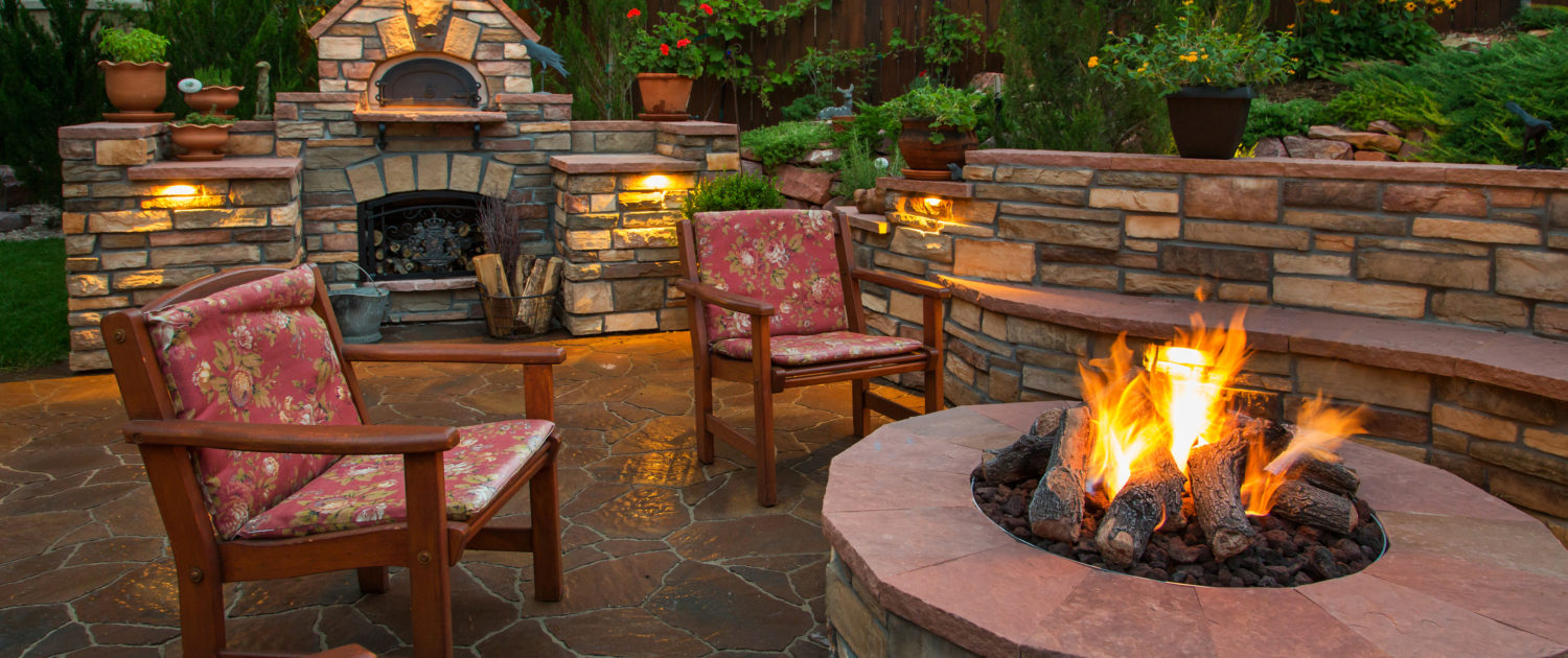 amazing backyard with pizza oven and fire pit